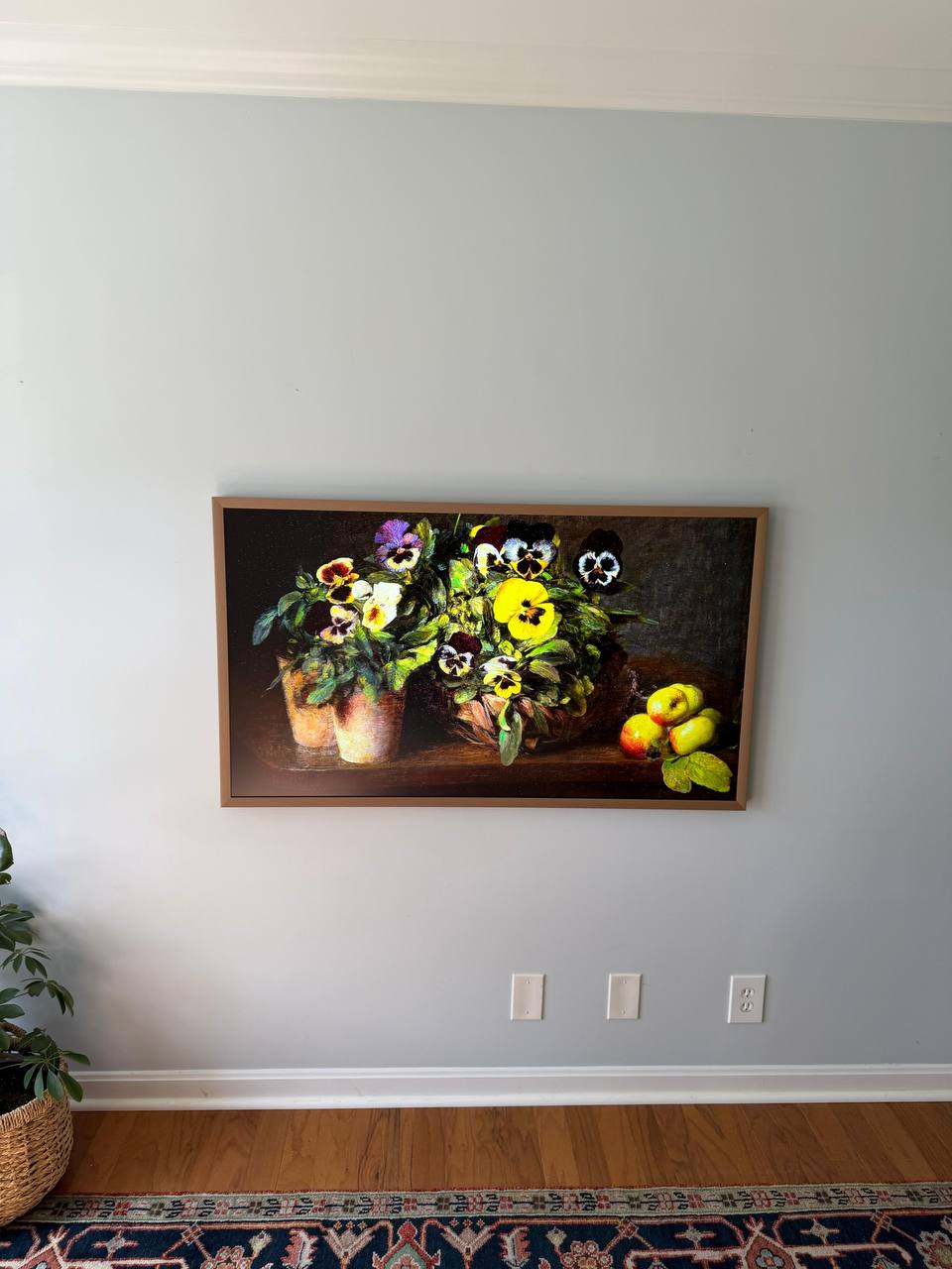 Samsung Frame style TV with concealed cables on a clean Houston wall