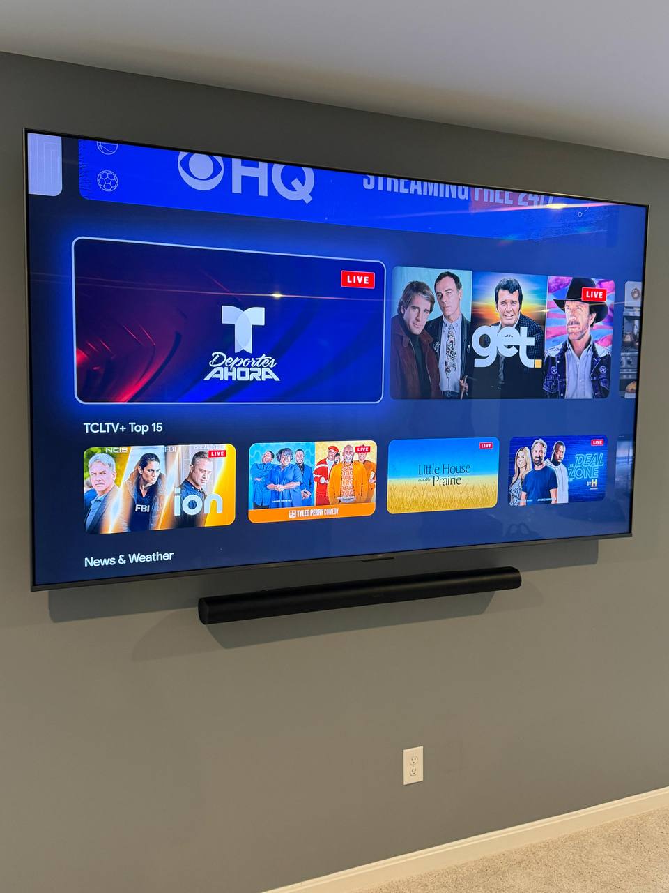 Home TV and soundbar aligned cleanly on a Houston wall