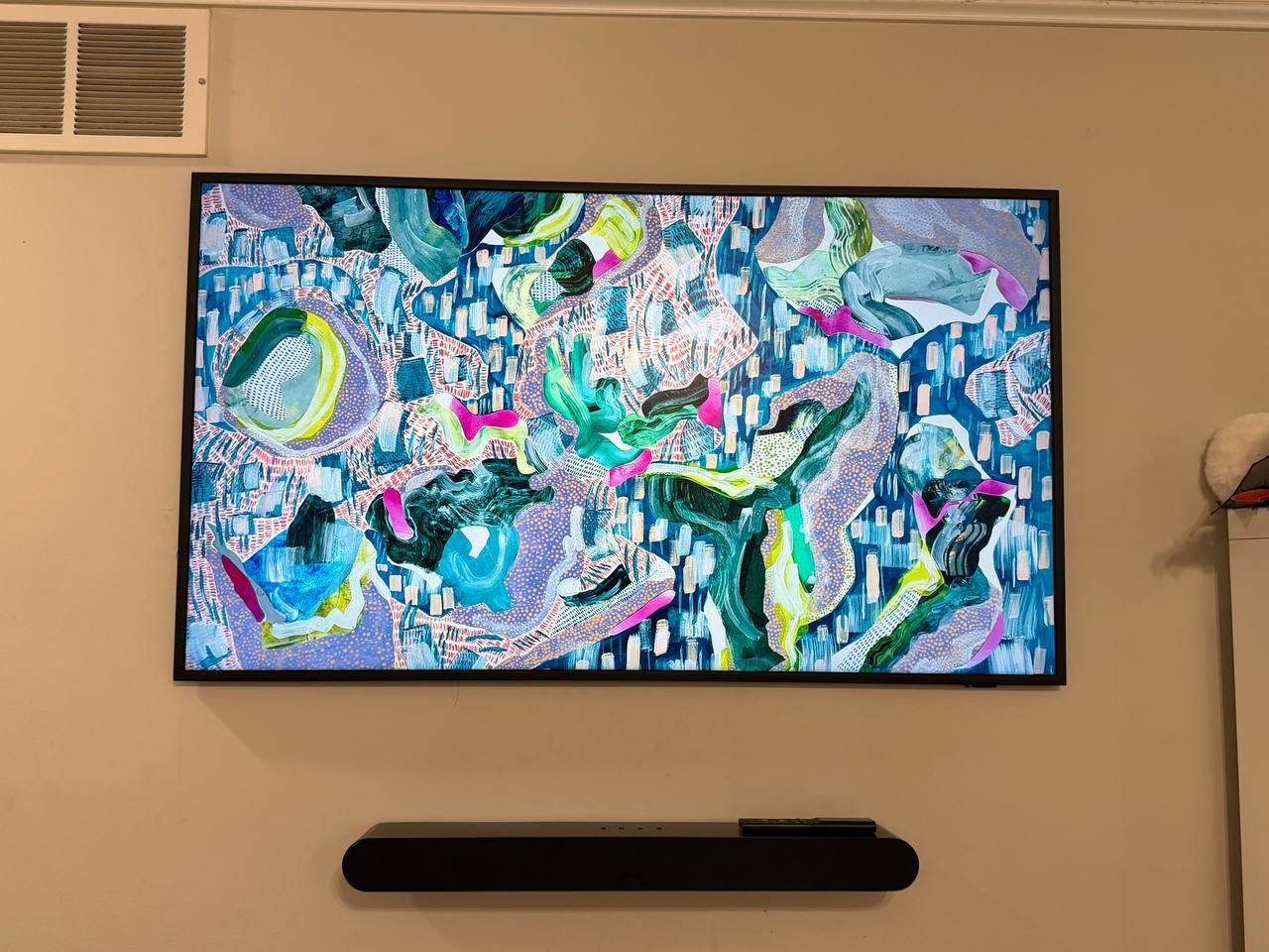 Wall mounted TV with soundbar setup in a Houston home