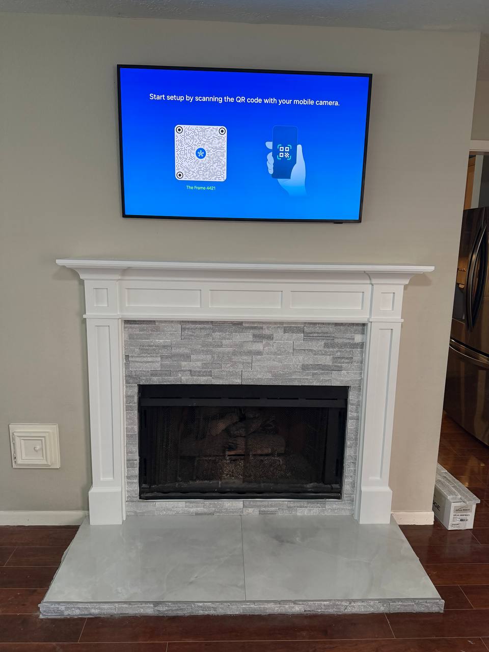 Completed fireplace TV mounting with clean finished alignment in Houston